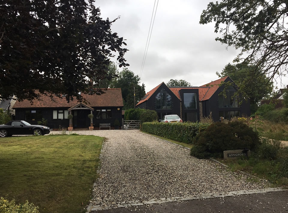 Use of black timber referencing surrounding farm buildings in Duddenhoe End.