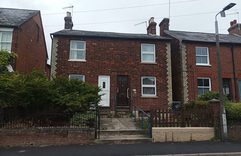 Red brick Victorian terraces with exterior chimneys, Ashdon Road.