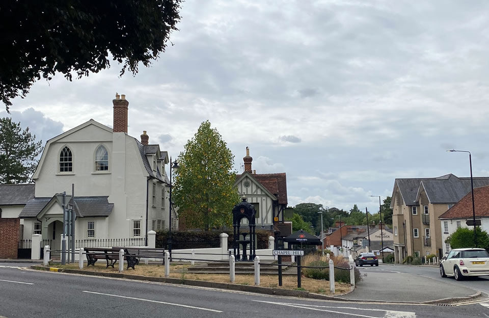 Central green space with landmark on Chapel Hill creates a gateway into the town centre.