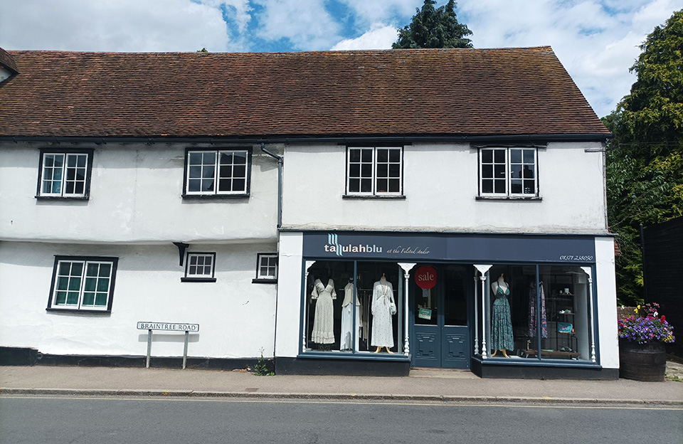 Modern shopfront design integrated into historic built form - Braintree Road, Felsted.