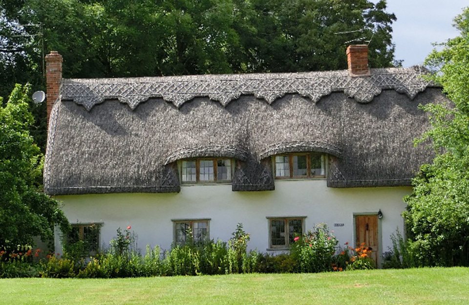 Dormer windows on the 17th Century thatched cottage in Takeley.