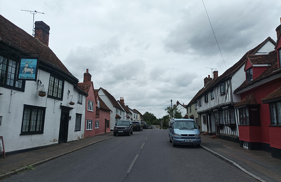 Strong sense of enclosure, continuous frontage and setbacks along the High Street, Stebbing.