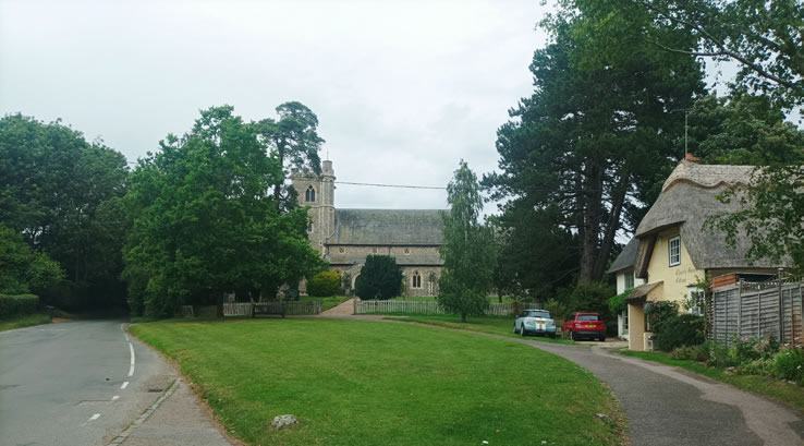 Focal village green at Northern end of Arkesden frames a view of the church.